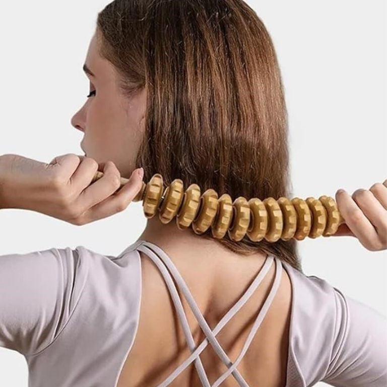 rouleau massage bois cible précisément les points d acupuncture